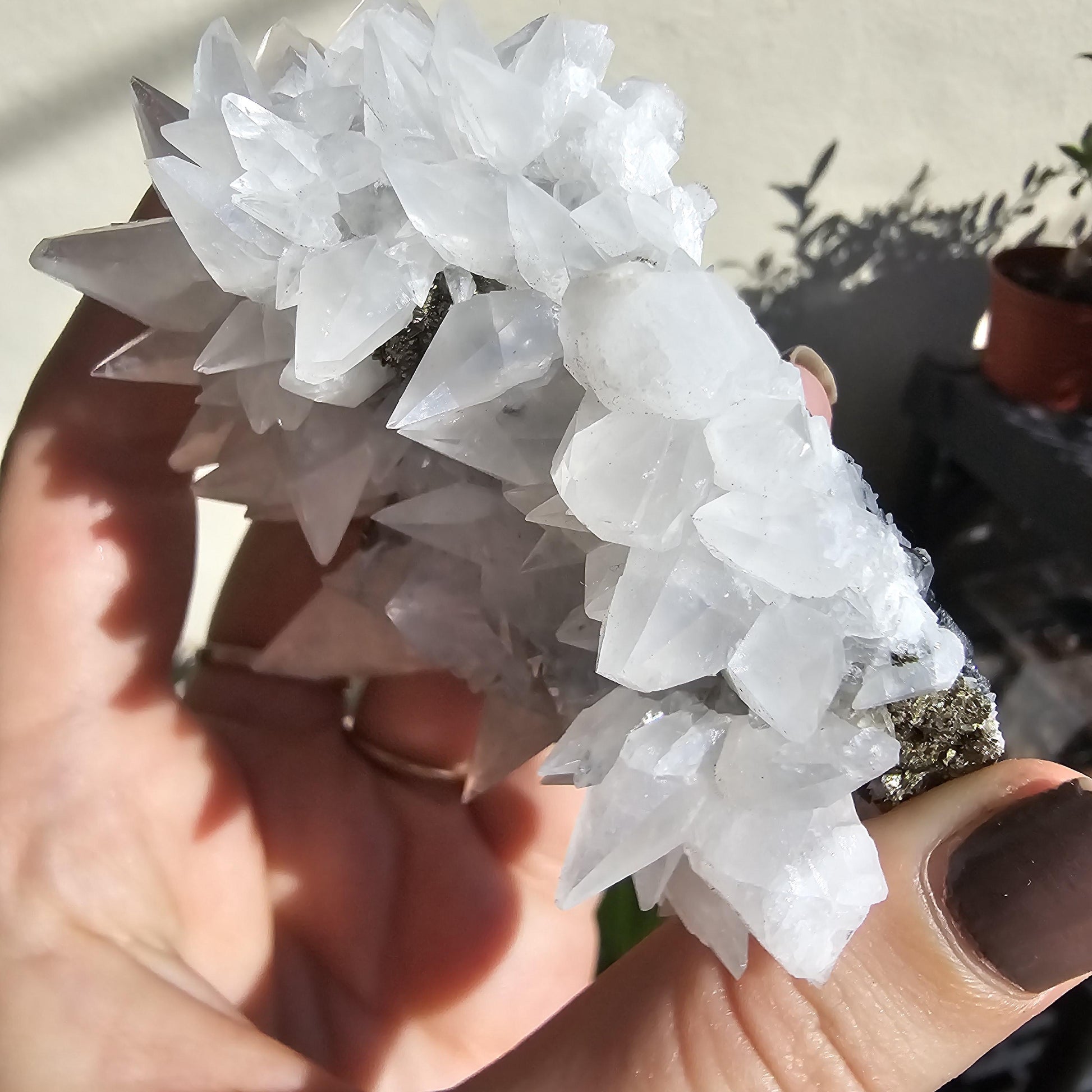 Snow White Calcite Specimen: Pyrite & Hematite Base, Chihuahua Mexico