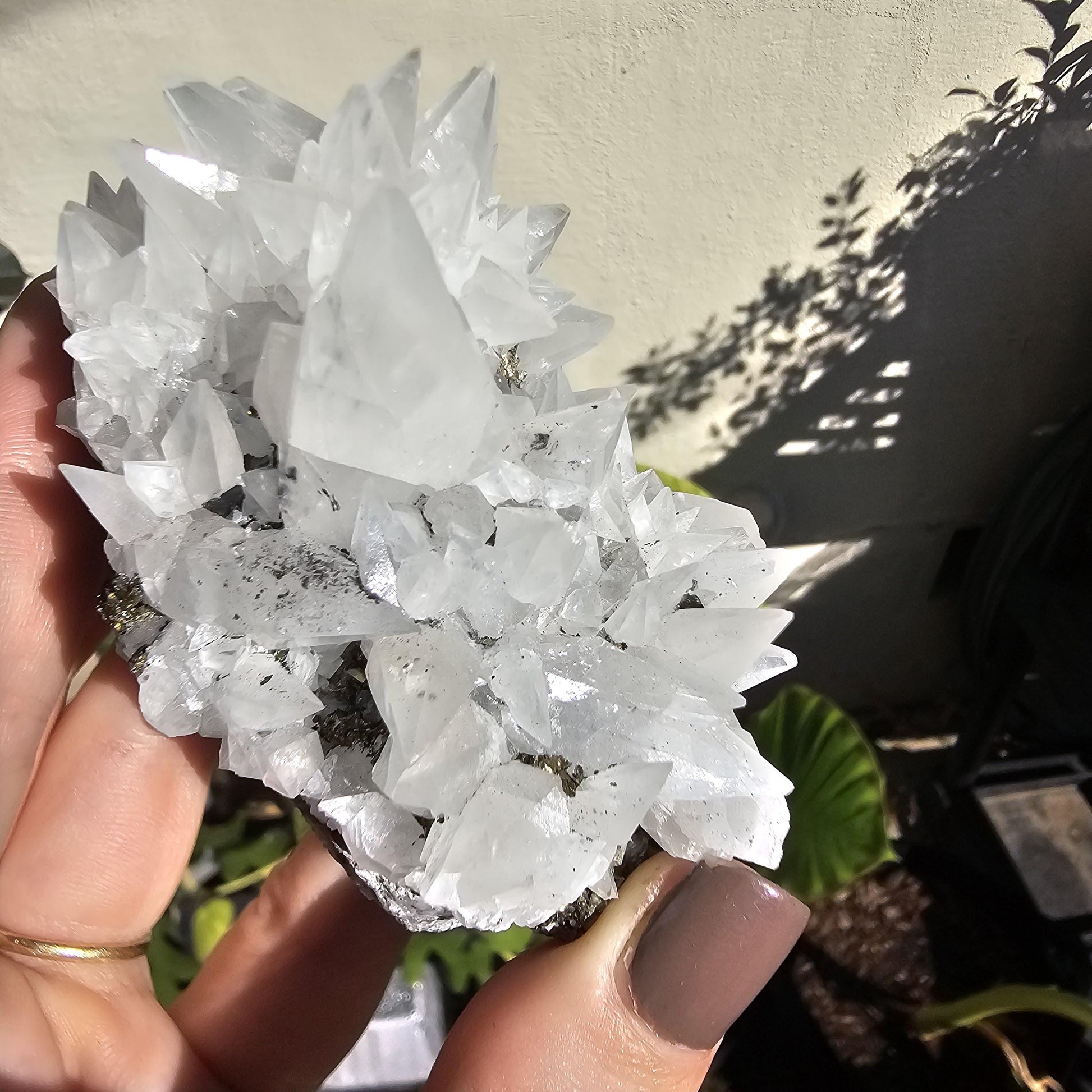 Snow White Calcite Specimen: Pyrite & Hematite Base, Chihuahua Mexico