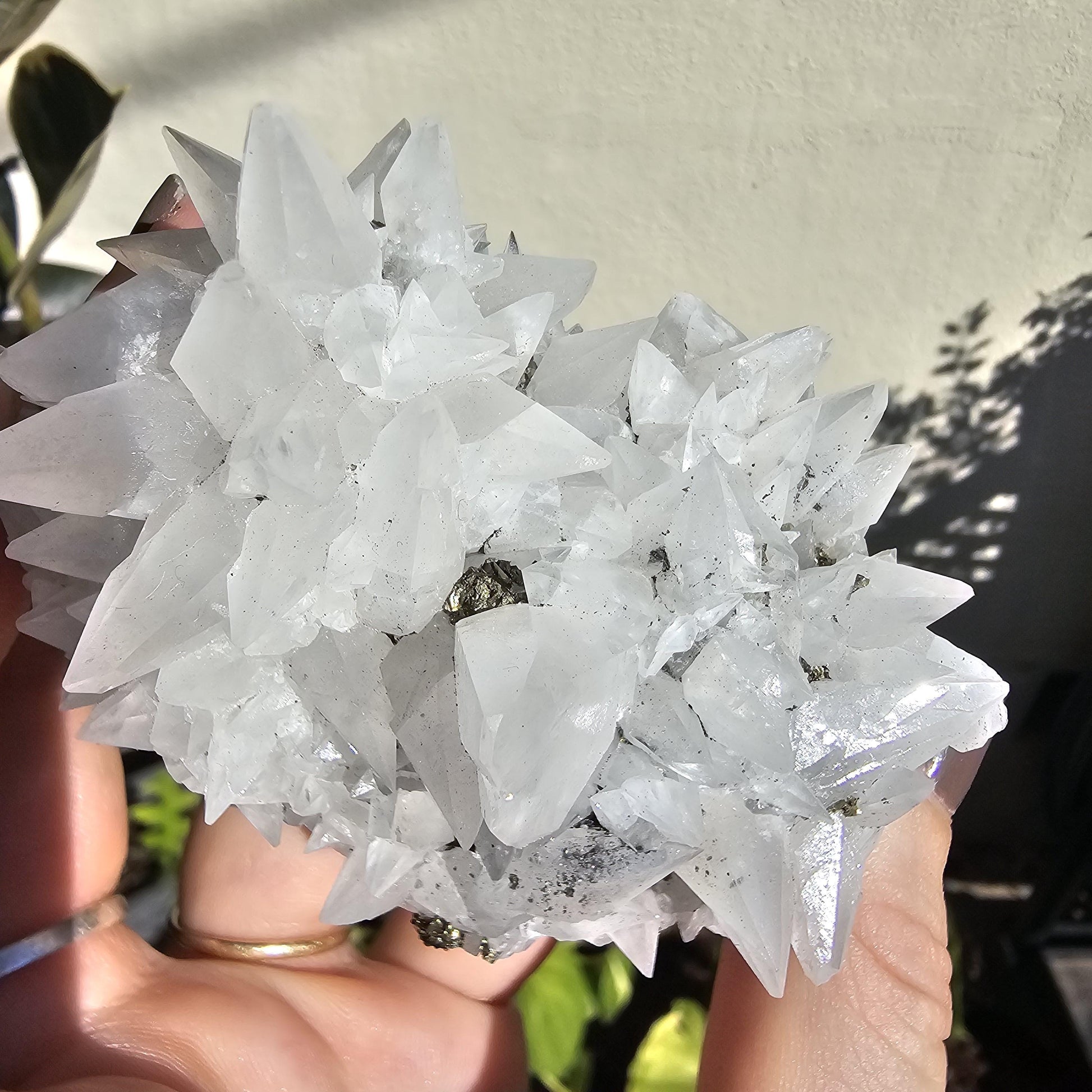 Snow White Calcite Specimen: Pyrite & Hematite Base, Chihuahua Mexico